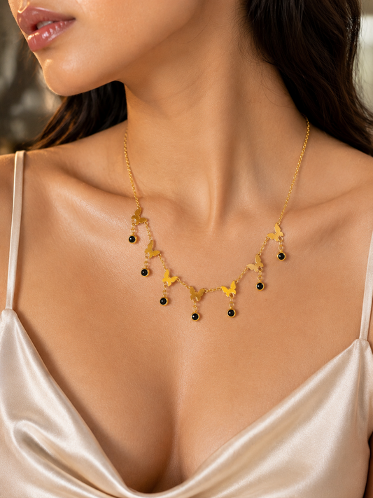 Golden Butterfly Black Bead Charm Necklace