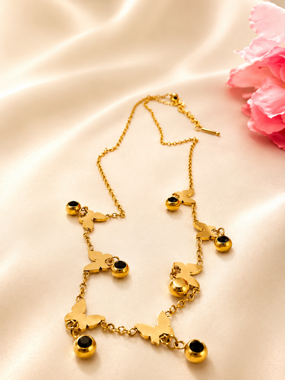 Golden Butterfly Black Bead Charm Necklace