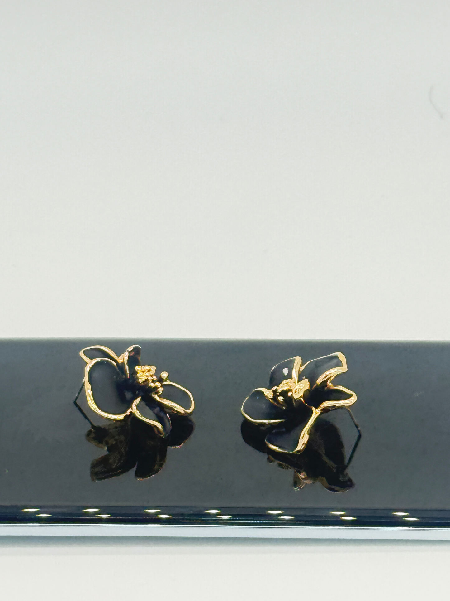Black Blossom Gold Stud Earrings